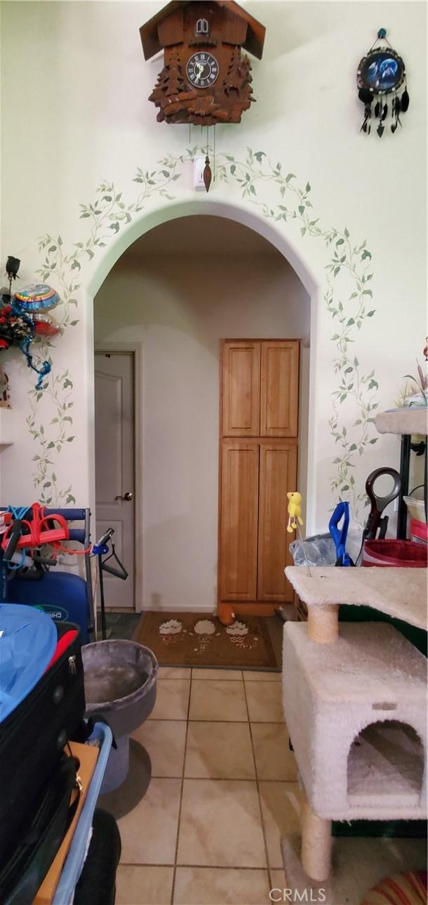 bathroom featuring tile patterned flooring and toilet