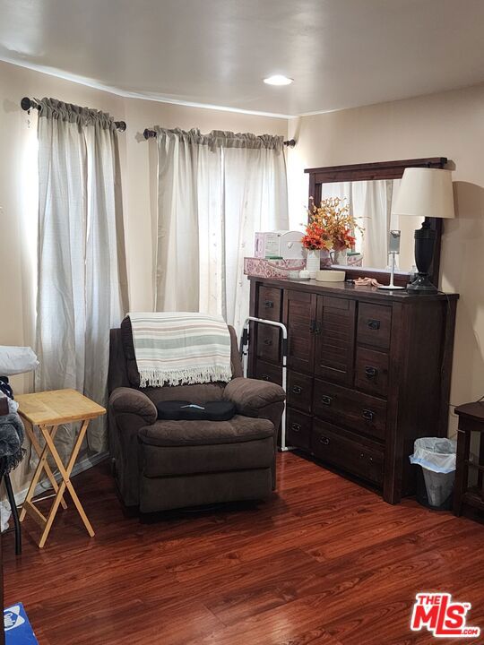 living area with dark wood-type flooring