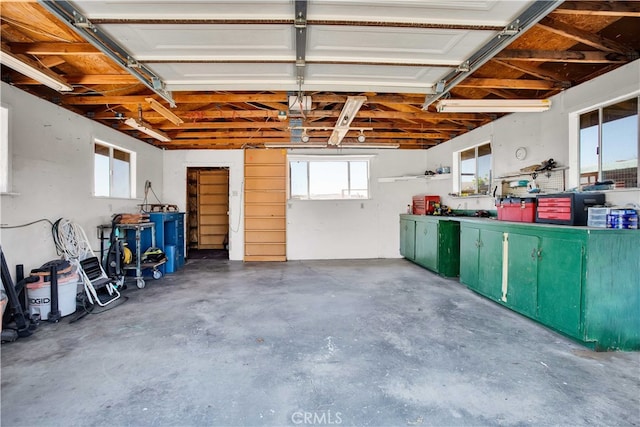 garage with a workshop area