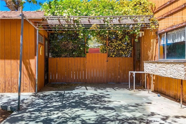 view of patio with fence