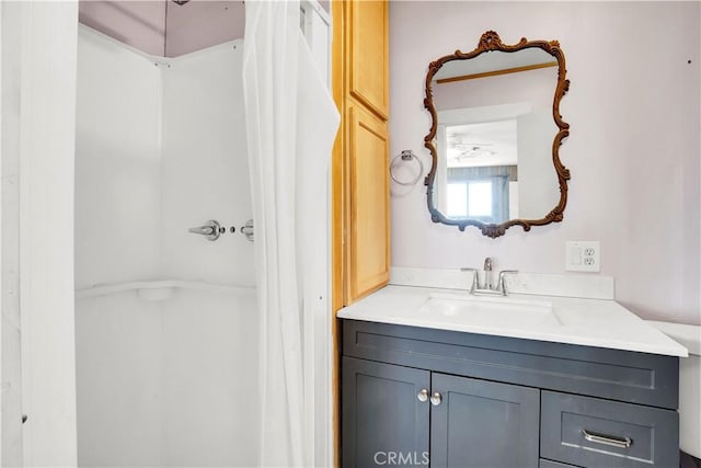 full bath featuring vanity and a shower with curtain