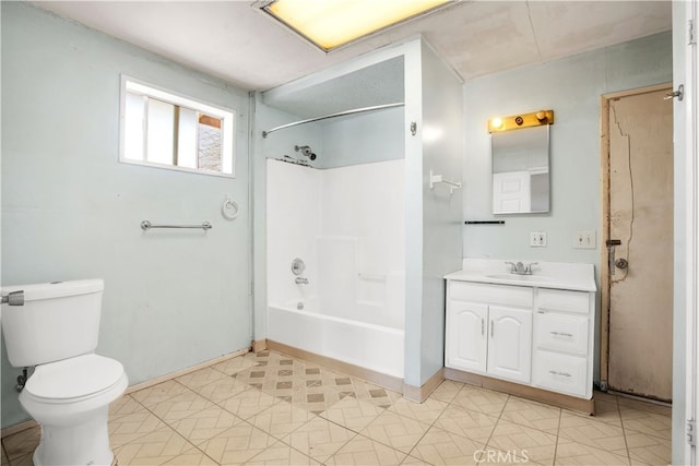 full bathroom featuring tile floors, bathtub / shower combination, toilet, and vanity