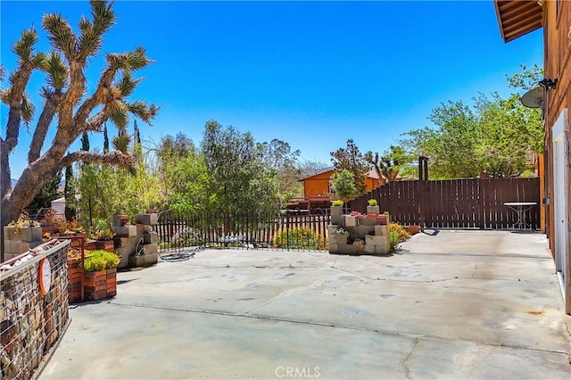 view of patio with fence