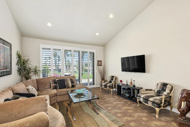 tiled living room featuring high vaulted ceiling