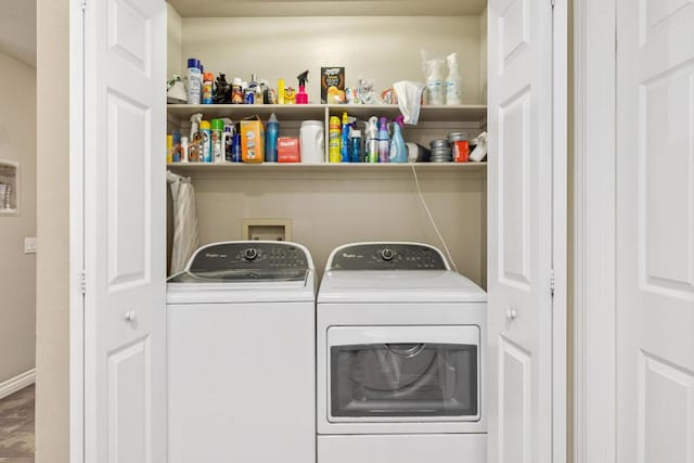 laundry room with washer and dryer