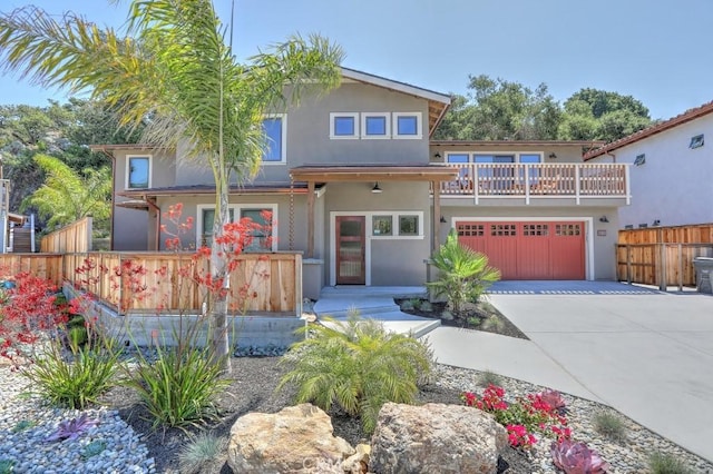 view of front of home with a balcony