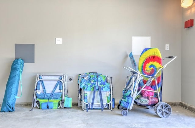 recreation room with concrete floors