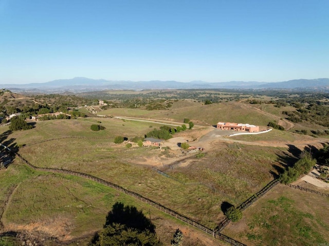 aerial view featuring a mountain view and a rural view