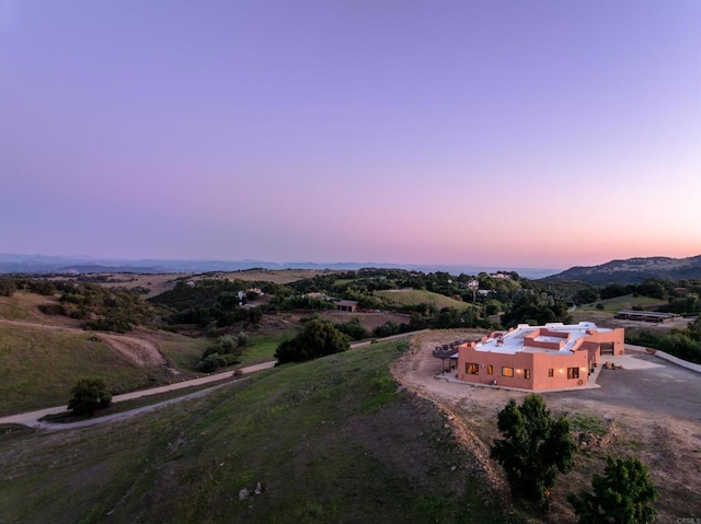 view of aerial view at dusk