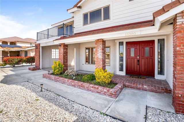 entrance to property with covered porch