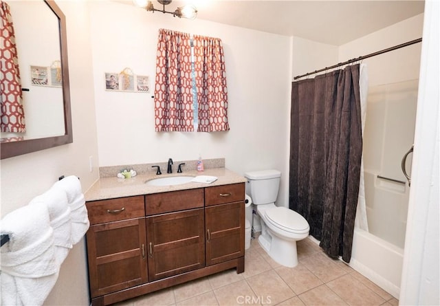 full bathroom with toilet, vanity, tile patterned floors, and shower / bathtub combination with curtain