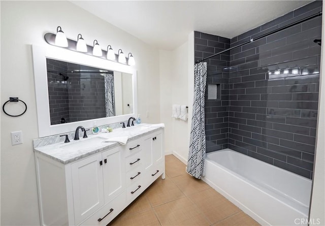 bathroom featuring vanity, tile patterned floors, and shower / bath combo with shower curtain