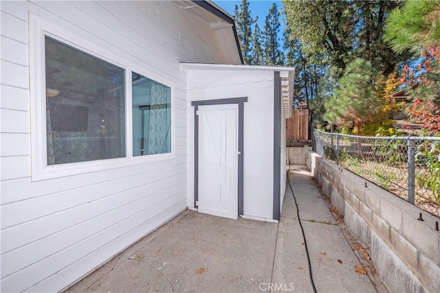 entrance to property with a patio area