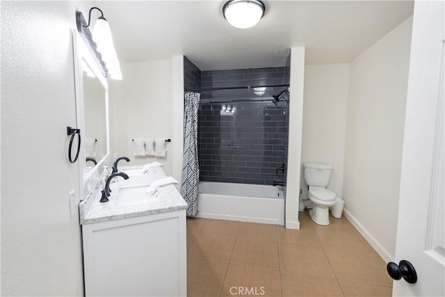 full bathroom featuring tile patterned flooring, vanity, toilet, and shower / tub combo with curtain