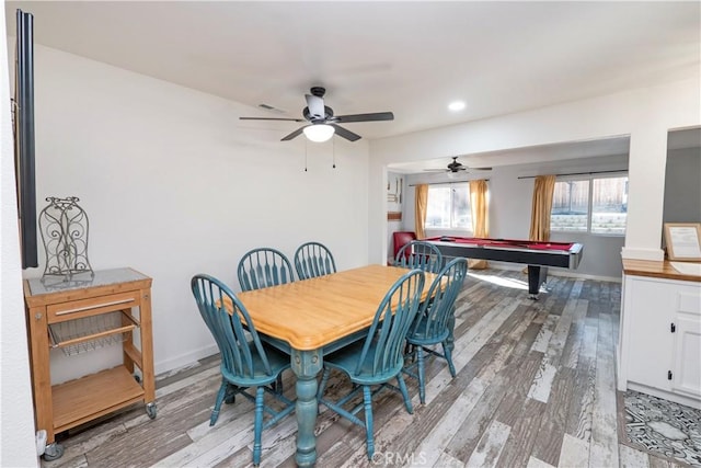 dining room featuring hardwood / wood-style floors, ceiling fan, and billiards