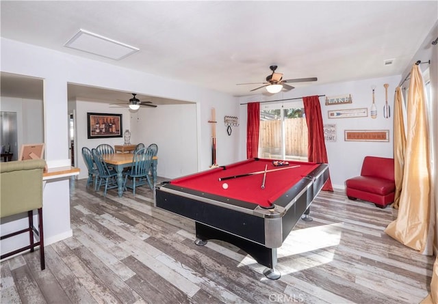 rec room with hardwood / wood-style floors, ceiling fan, and billiards