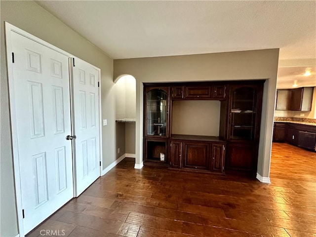 interior space with dark wood-type flooring