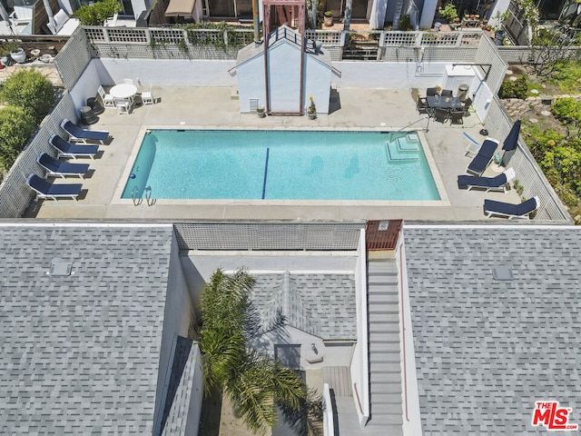 view of swimming pool featuring a patio