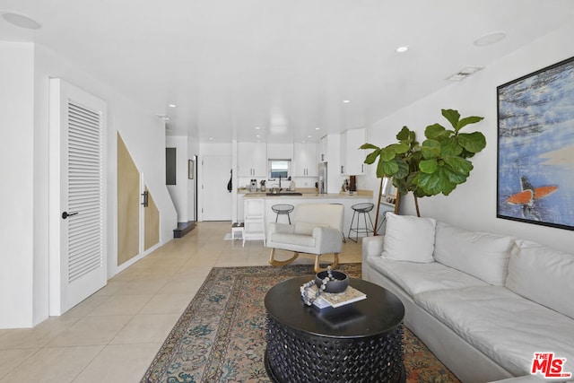 living room featuring light tile patterned floors