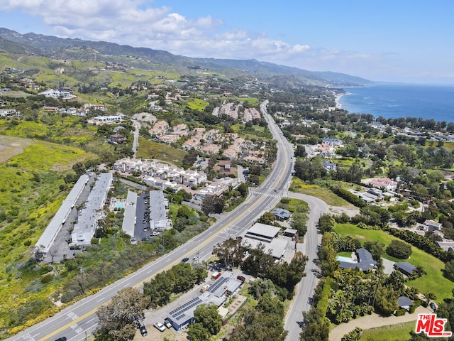 drone / aerial view featuring a mountain view