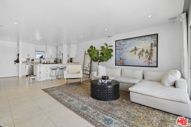 living room featuring light tile patterned floors