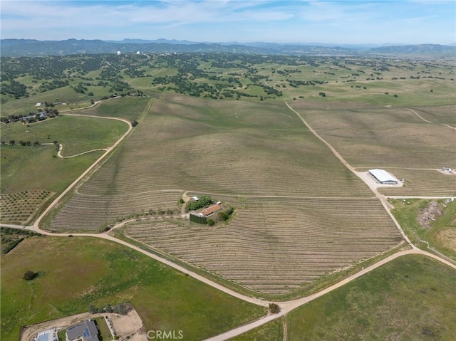 aerial view featuring a rural view and a mountain view