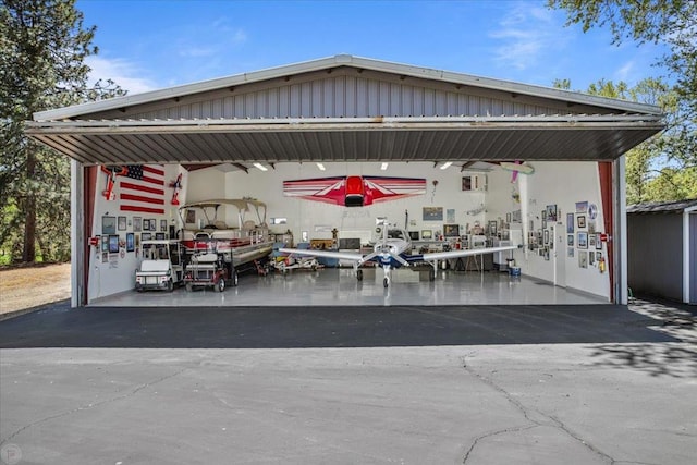 exterior space with a carport