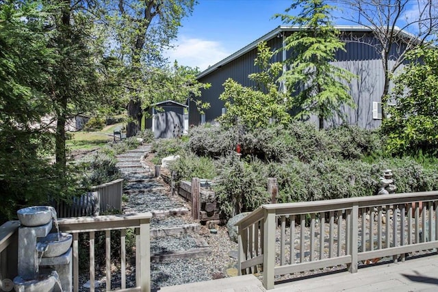 view of yard with a wooden deck