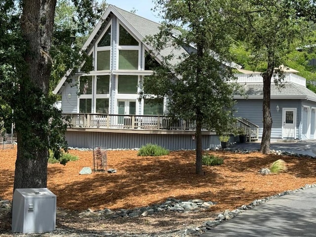 view of property exterior featuring french doors