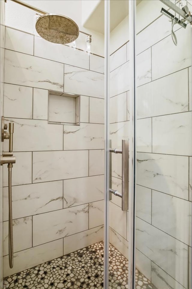 bathroom featuring walk in shower