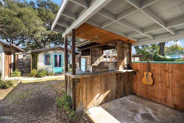 view of patio featuring an outdoor structure