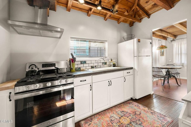 kitchen featuring wooden ceiling, ventilation hood, white cabinets, sink, and gas range