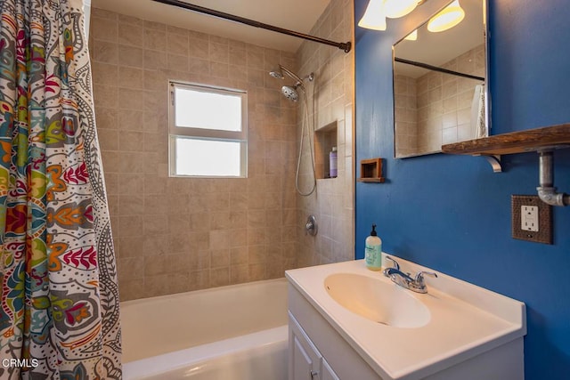 bathroom with vanity and shower / tub combo