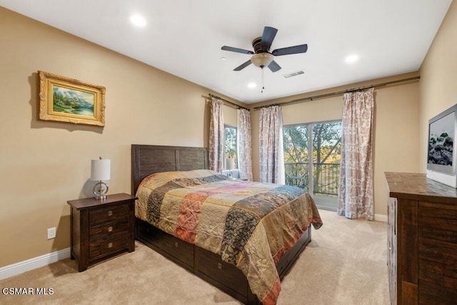 carpeted bedroom featuring access to exterior and ceiling fan