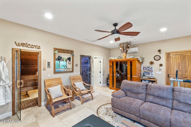 tiled living room featuring a wall mounted AC and ceiling fan