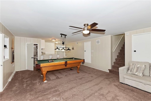 playroom featuring ceiling fan, wooden walls, dark carpet, and pool table