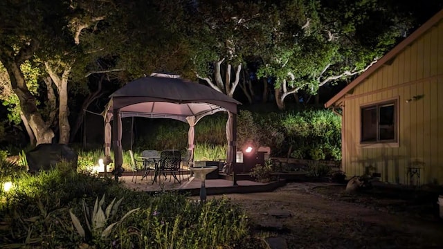 view of yard featuring a gazebo and a patio