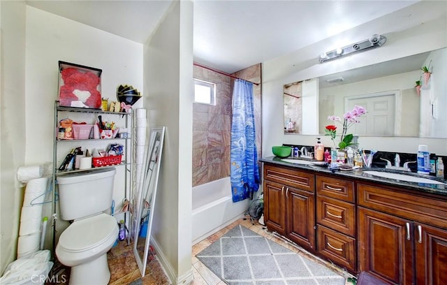 full bathroom featuring toilet, shower / tub combo, and vanity