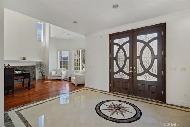 7264 W 88th Pl, Los Angeles, CA 90045 - entrance foyer with inlaid floor details, baseboards, ornamental molding, recessed lighting, and a premium fireplace