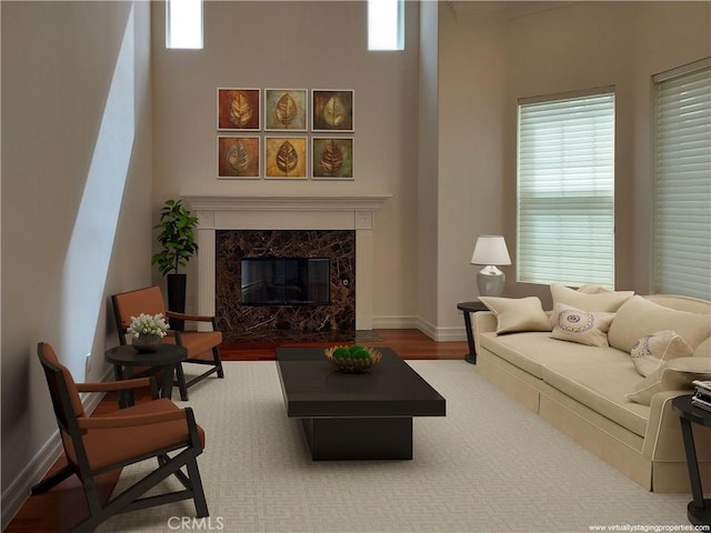 7264 W 88th Pl, Los Angeles, CA 90045 - living area featuring wood finished floors, a fireplace, and baseboards
