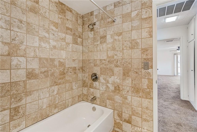 bathroom with tiled shower / bath