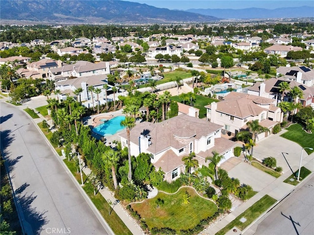 drone / aerial view featuring a mountain view