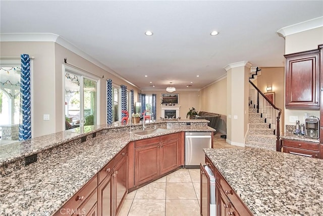 kitchen featuring light stone countertops, stainless steel dishwasher, crown molding, sink, and light tile patterned flooring