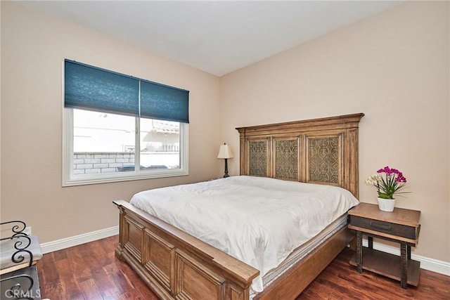 bedroom featuring dark hardwood / wood-style flooring