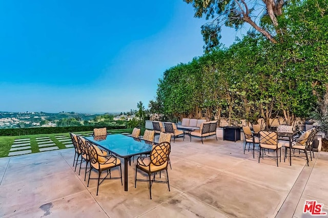 view of terrace featuring an outdoor living space