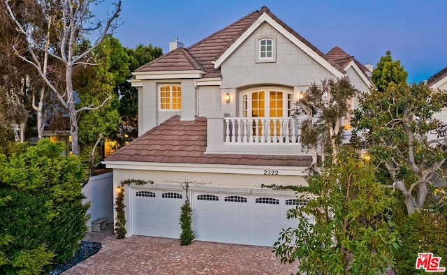 view of front of property featuring a garage