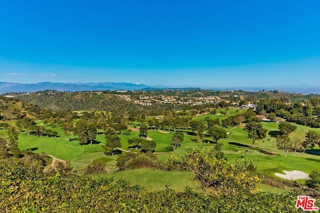 birds eye view of property featuring a mountain view