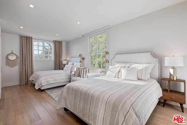 bedroom featuring light hardwood / wood-style flooring