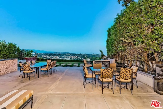 view of terrace featuring a mountain view