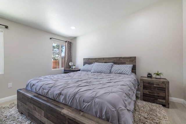 bedroom with light hardwood / wood-style flooring